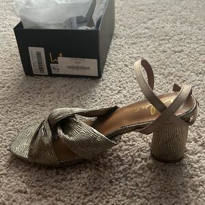 Brand new gold heels